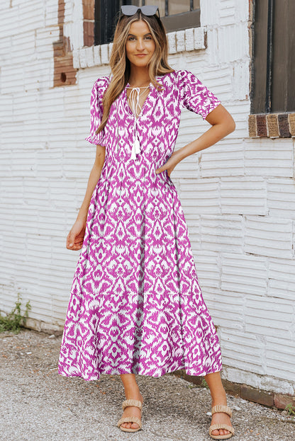 Roze casual maxi-jurk met geometrische print en V-hals