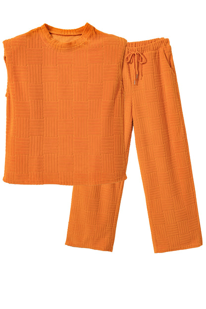 Oranje getextureerde tanktop en broek met wijde pijpen