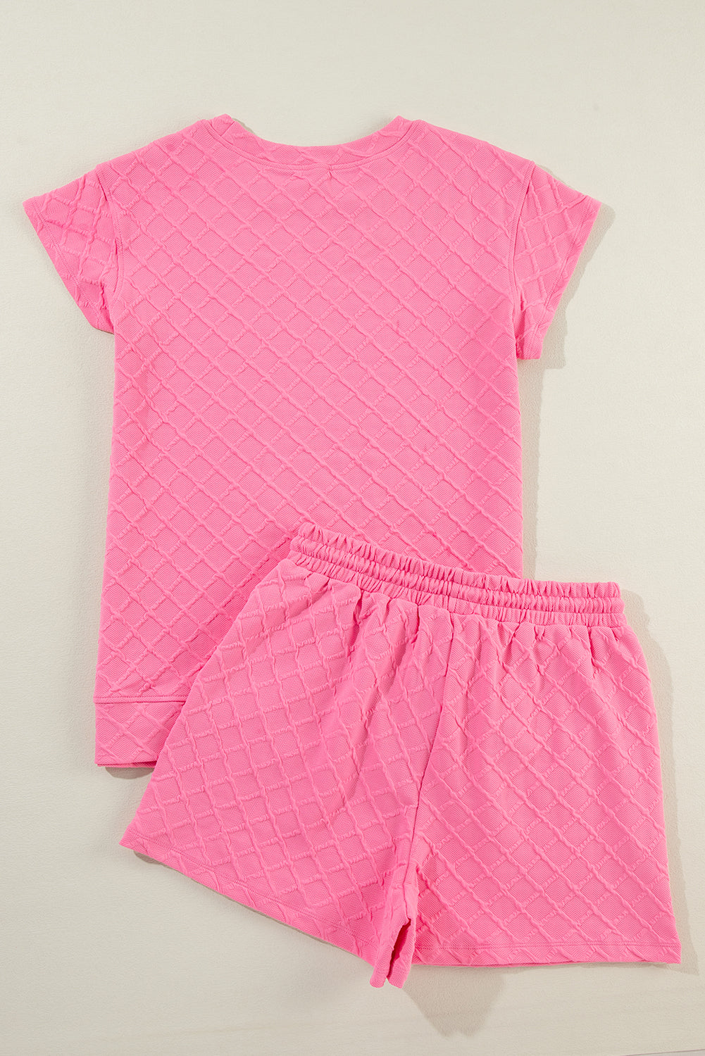 Sachet roze geruit T-shirt met textuur en short met trekkoord