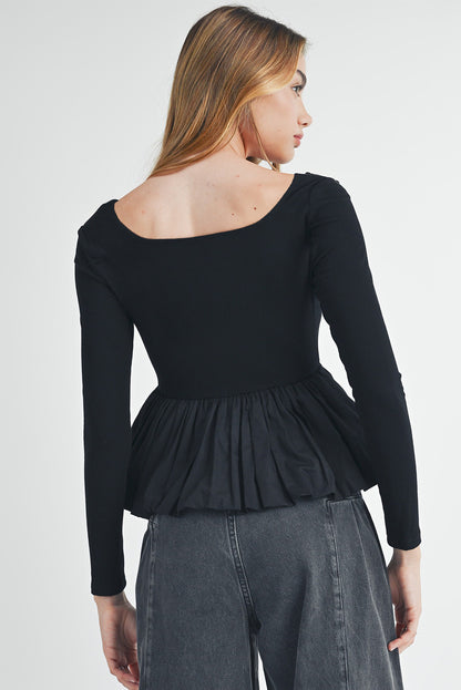 Black geribbeld gebreide schep met lange mouwen Peplum patchwork top